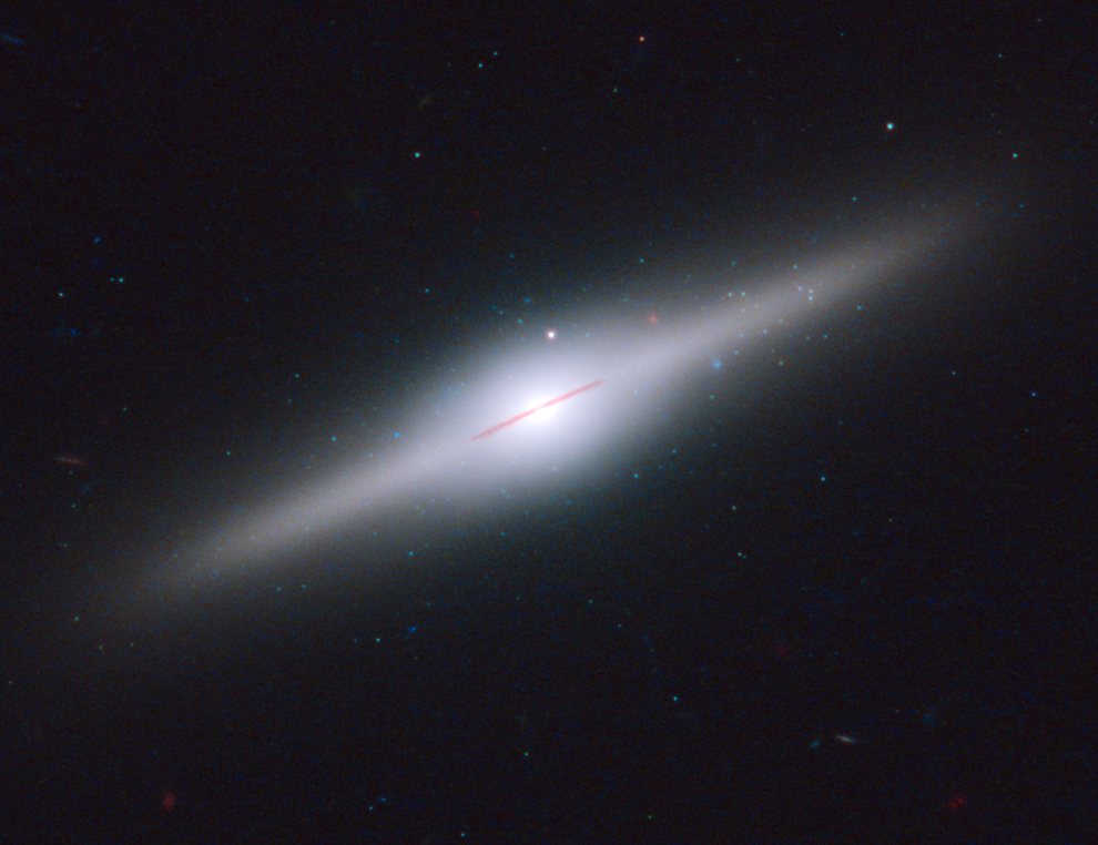 ESO243-49_Spiral Galaxy Edge-on_HST_NASA,ESA,S-Farrell(Sydney-Institute-for-Astronomy,Uni-of-Sydney)_hs-2012-11-b-full_990w