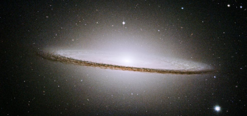 M104 - The Sombrero Galaxy spiral edge-on dark band of interstellar gas & dust + large central bulge marks it a ty-Sa even though its spiral arms cannot be seen_990w