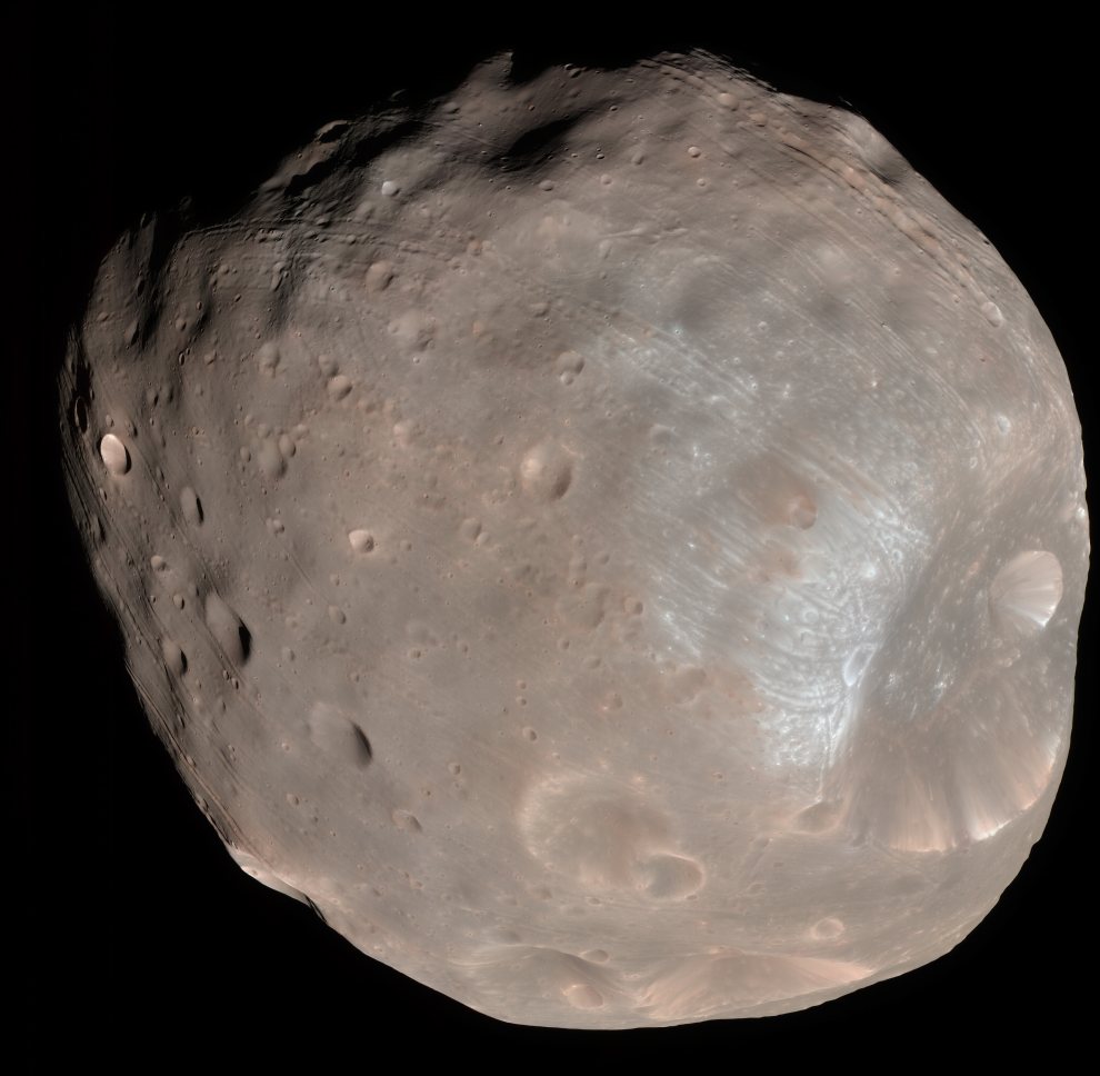 Mars - The moon Phobos 28 km long by 20 km wide prograde and synchronous orbit @9,378 km from CM 7 hrs 39 mins - Mars Reconnaissance Orbiter HiRISE true colour, 23 March 2008_Phobos_colour_2008_990w