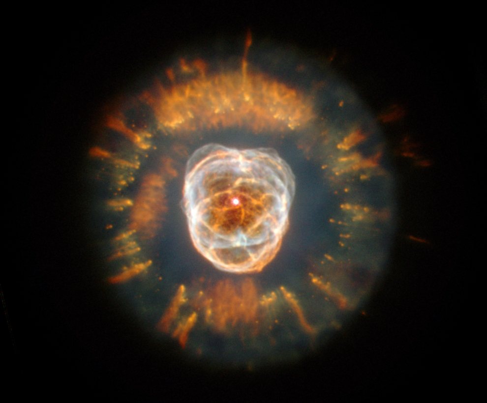 NGC2392 Eskimo (Planetary) Nebula in Gemini @ 5,000 ly N-red H-green O-blue He-violet_HST WFPC2 10&11-01-2000_hs-2000-07-a-full_990w