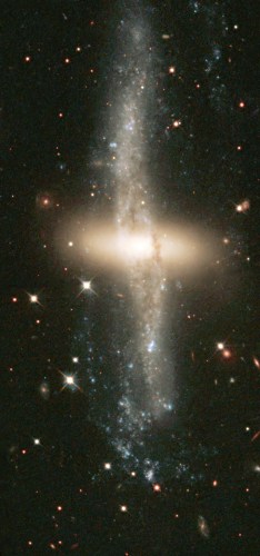 NGC 4650A is a S0^a pec polar-ring lenticular galaxy in Centaurus;HST 4 May 1999; J. Gallagher(UW-M) et al. & Hubble Heritage Team (AURA+STScI+NASA)_hs-1999-16-a-full