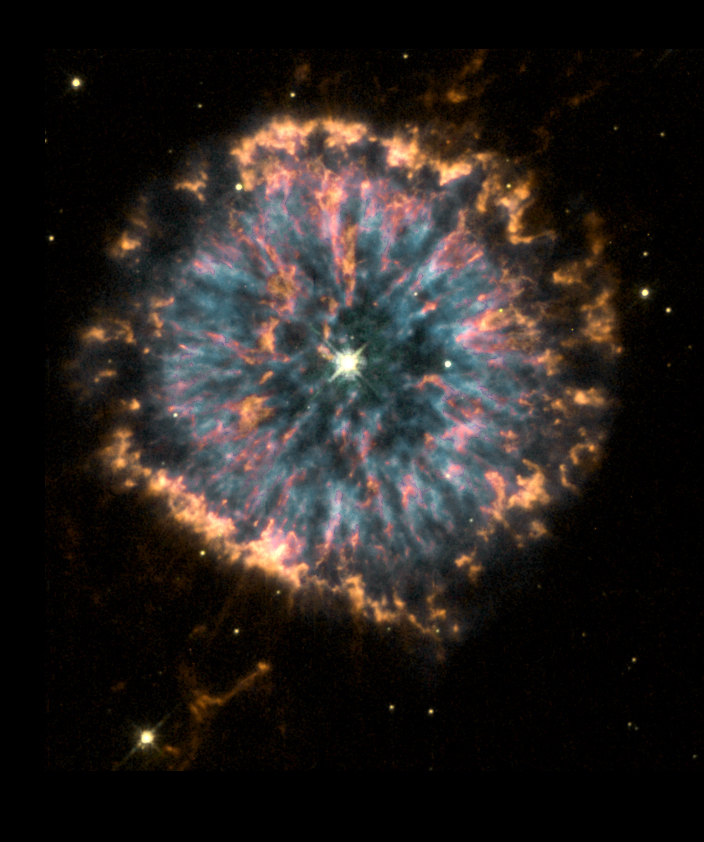 NGC6751 - The Glowing Eye Planetary Nebula in Aquila_HST NASA The Hubble Heritage Team AURA_Filter for ionized-Oxygen(++)=blue; Hydrogen(+)=green; Nitrogen(+)=red