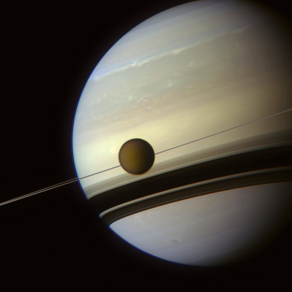 Saturn viewed with rings edge-on but shaddowed on the planet and Titan - HST_saturntitan2_cassini_1200_990w