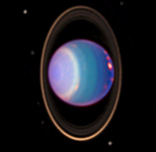 Uranus - A false-colour image of the planet, its rings and six of its satellite moons - HST 1997_Uranusandrings_500w