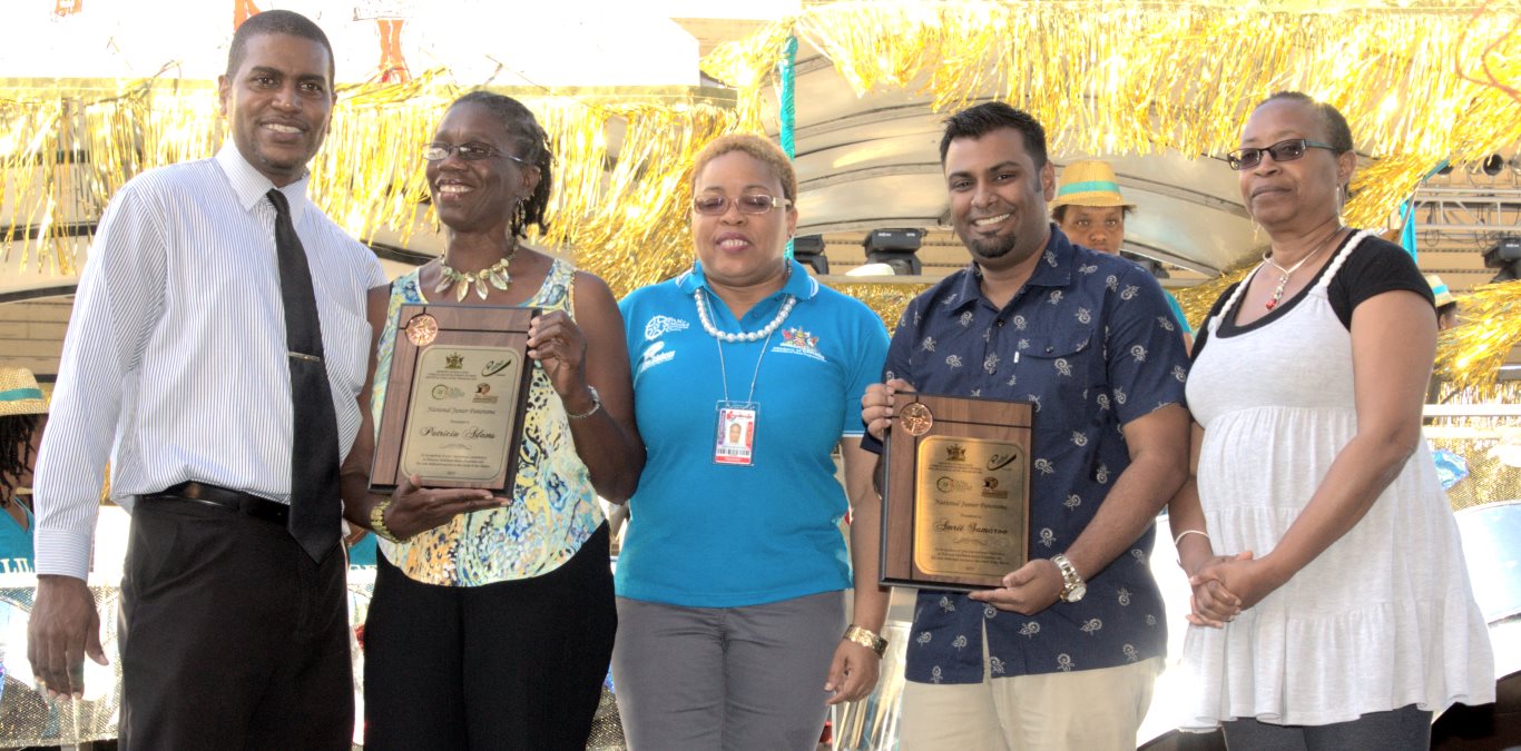 Ms Patricia Adams and Mr Amrit Samaroo show their respective awards 20150208 by John Schmidt