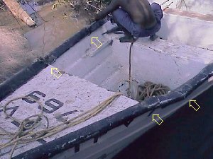 Boat damaged by bridge debris